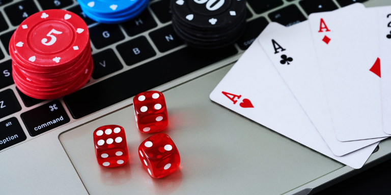 Gambling apparatus on top of a Macbook
