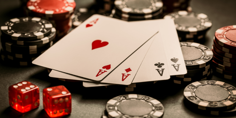 Poker apparatus scatted around four ace cards