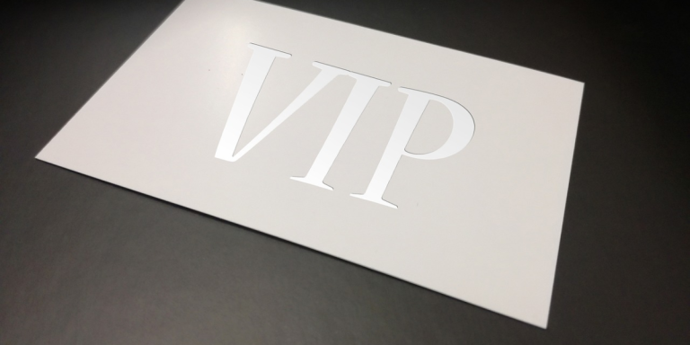 Business card that reads "VIP" on a black background